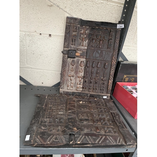 80 - Pair of African carved window shutters