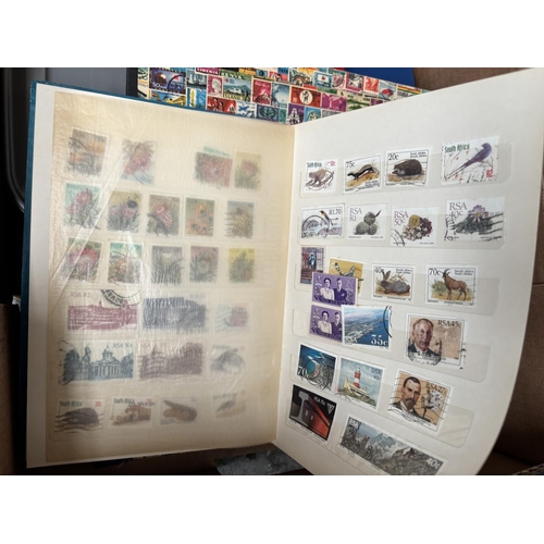 828 - Box containing albums of World stamps and a quantity of loose stamps