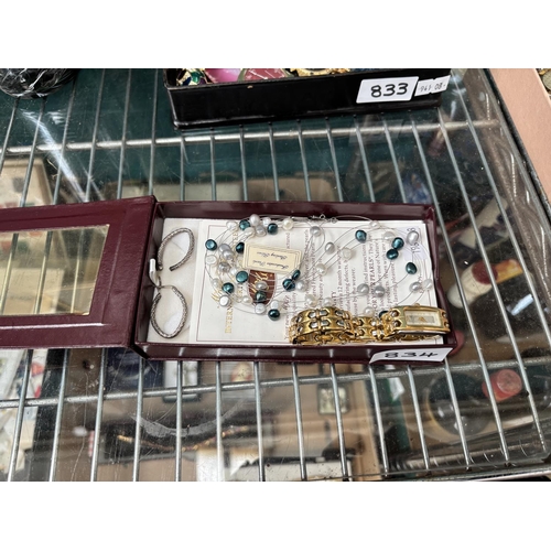 834 - Mother of pearl faced Rotary watch, silver earrings and a pearl necklace