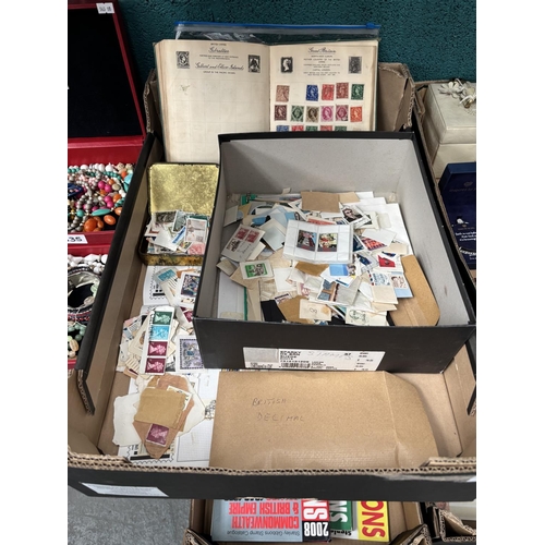 836 - Box containing a stamp album and a quantity of loose stamps
