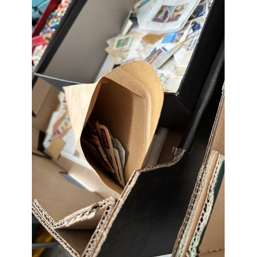 836 - Box containing a stamp album and a quantity of loose stamps