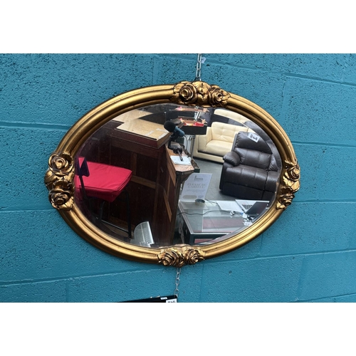 845 - Ornately framed oval bevel edge mirror (80x60cm)