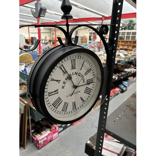 858 - 'Kensington London' double sided railway station style clock