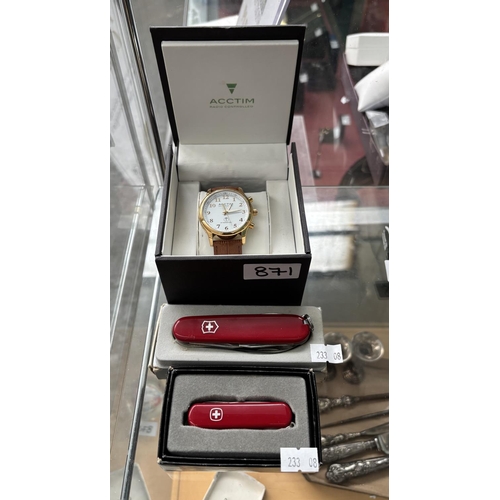 871 - Boxed Acctim radio controlled watch and 2 Swiss Army knives