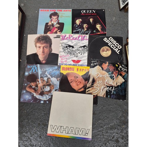 176 - Box containing LPs and singles including Iron Maiden, Wham and Status Quo