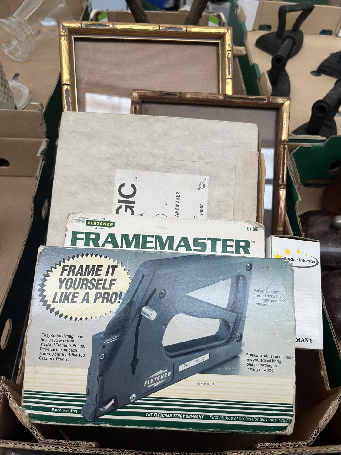 Box containing vintage framing equipment including a Fletcher ...