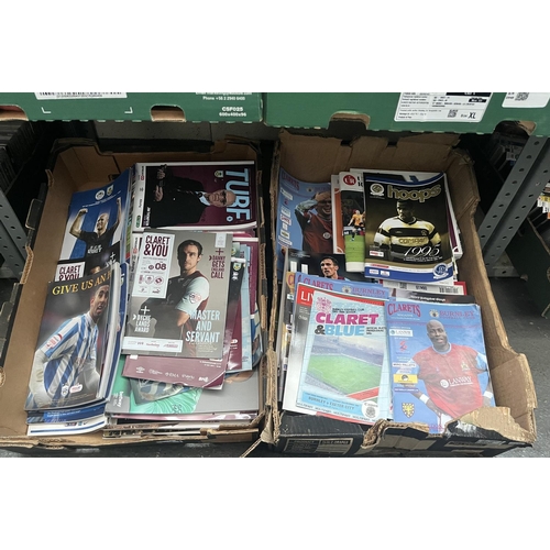 86 - 2 Boxes containing Burnley FC match day programmes, 2001 onwards