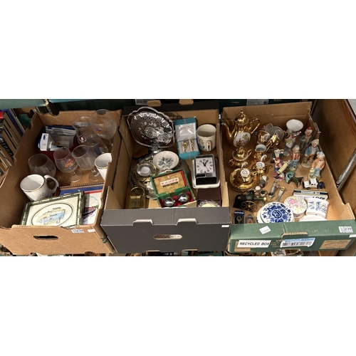 3 Boxes containing an ornate gold effect tea set, clown figures and ...