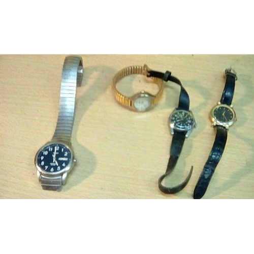 100 - Collection of four vintage watches including Seiko & TIMEX