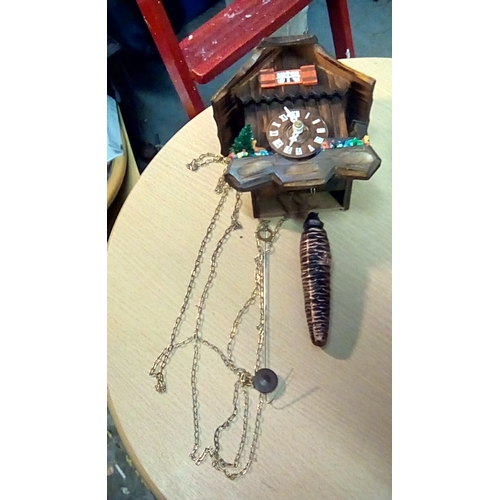 131 - Small Cuckoo Clock With Brass Weight and Pendulum