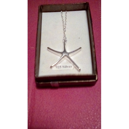 164 - Lovely Boxed Large Silver Star Necklace