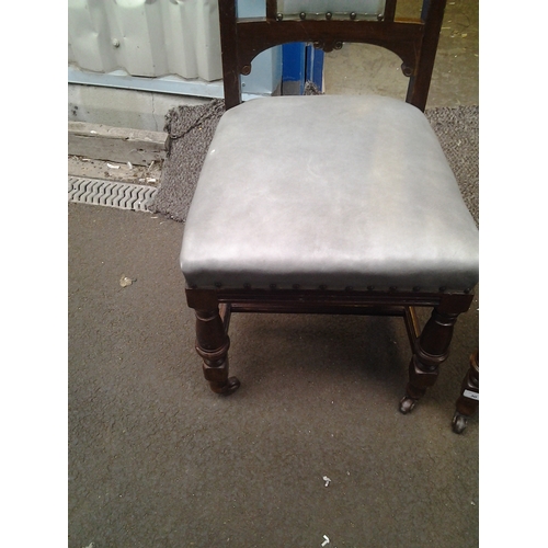 58 - LOVELY PAIR OF EDWARDIAN LOVELY CARVED WOOD DINING CHAIRS WITH STUDDED SEATS with front casters