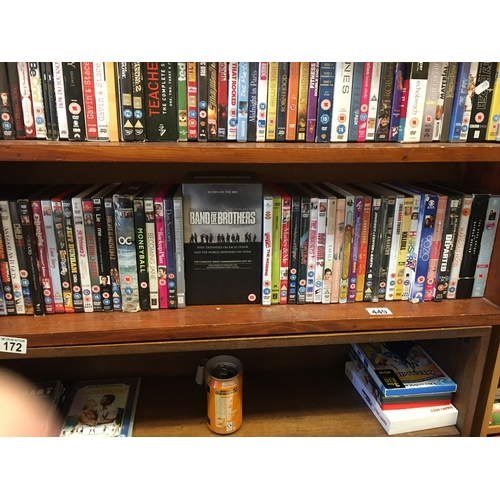 343 - BOTTOM SHELVE OF DVD'S