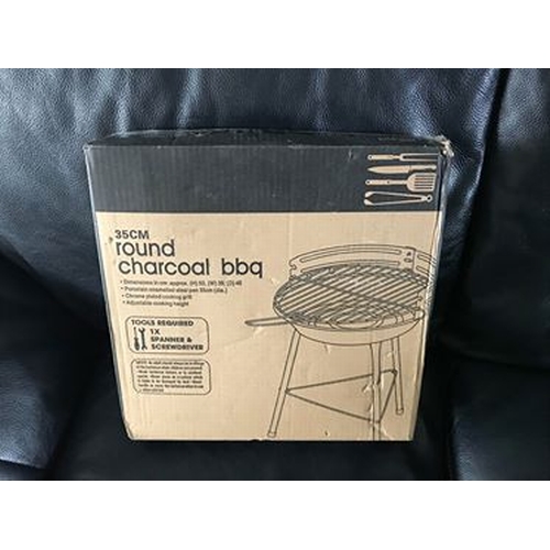 113 - BOXED ROUND CHARCOAL BBQ