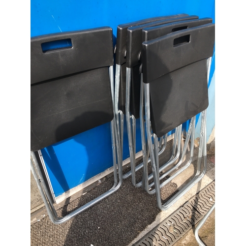 117 - NICE COLLECTION OF SIX NEW BLACK PLASTIC FOLDING CHAIRS