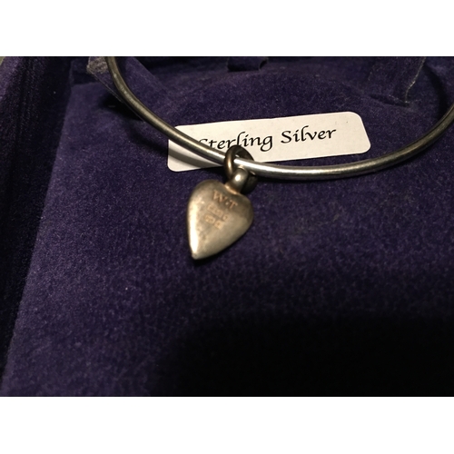 179 - LOVELY SILVER BANGLE WITH HEART STAMPED W.T. PENDANT IN PRESENTATION BOX