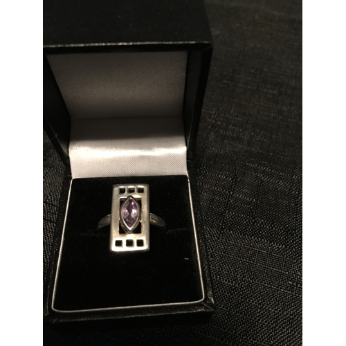 292 - LOVELY LARGE SILVER 925 PURPLE STONE RING SET IN CELTIC STYLE