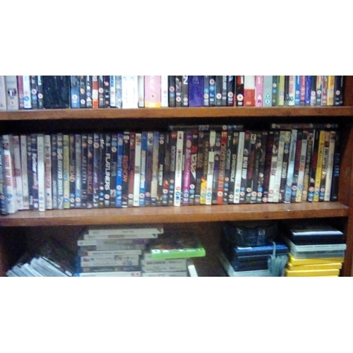 306 - SHELVE OF DVDS