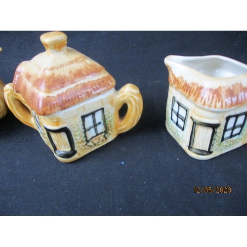 172 - LOVELY Trio of cottage style teapot, sugar bowl and milk jug. (l)