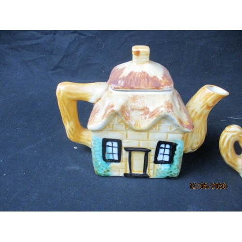 172 - LOVELY Trio of cottage style teapot, sugar bowl and milk jug. (l)