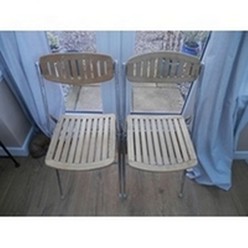 201 - A pair of sturdy chrome and solid wood folding chairs suitable indoors and outside