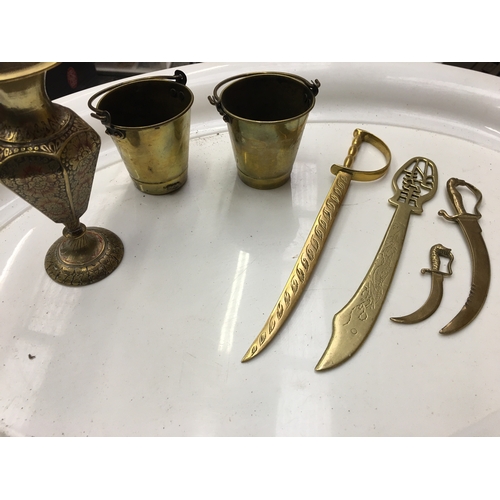 133 - NICE COLLECTION OF BRASS INCLUDING DECORATIVE SWORDS, CLOSSONIE STYLE VASE AND VINTAGE PALES