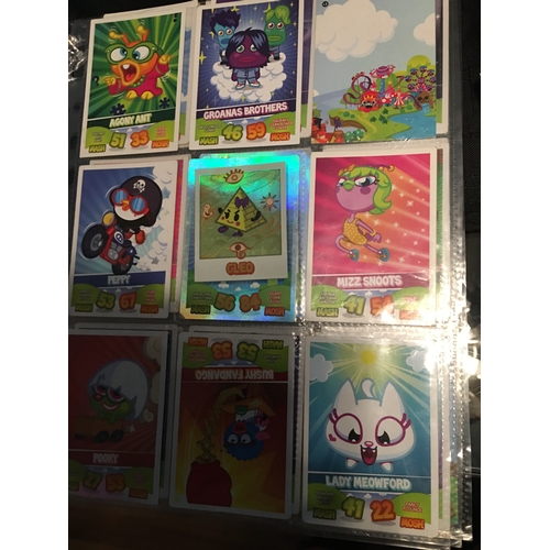 303 - ASSORTMENT OF50 TOPPS MOSHI MONSTERS MASH UP INCLUDING 4 HOLOGRAMS