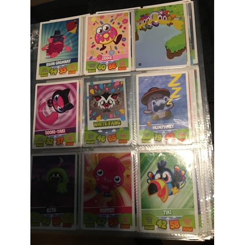 303 - ASSORTMENT OF50 TOPPS MOSHI MONSTERS MASH UP INCLUDING 4 HOLOGRAMS