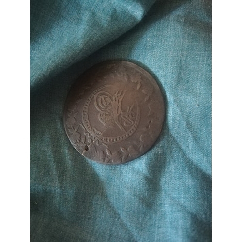 384 - Large copper coin possibly ottoman empire

Large copper coin damaged as can be seen. Arabic writing ... 