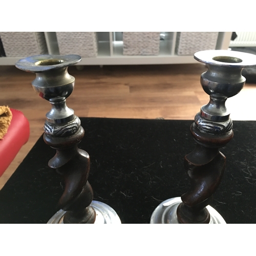 27 - CRACKING PAIR OF VINTAGE TWIST WOODEN AND CHROME CANDLESTICKS