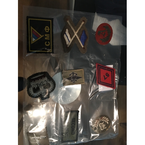 296 - SLEEVE OF 9 MILITARY CLOTH BADGES