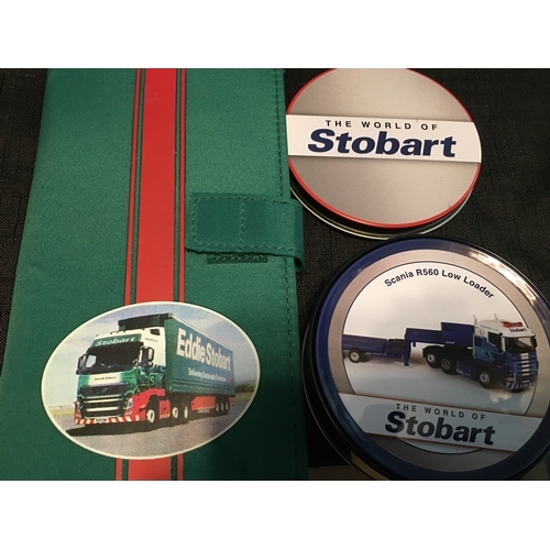 348 - NEW EDDIE STOBART NOTEPAD AND PEN AND METAL TIN OF PLACEMATS