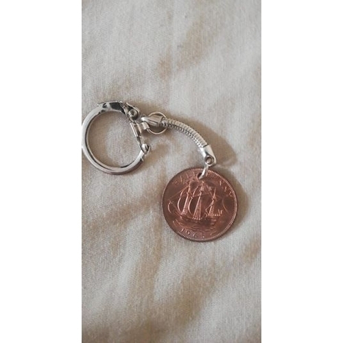 369 - 1967 penny keyring and a 1965 half penny keyring