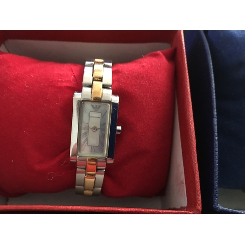 390 - TWO BOXED WATCHES