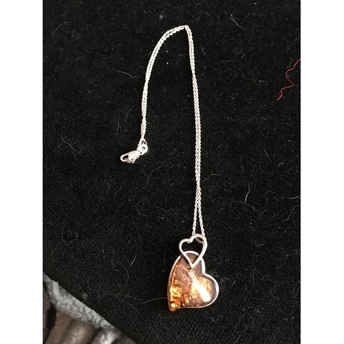 200L - Lovely Silver necklace with amber coloured stone in heart shape