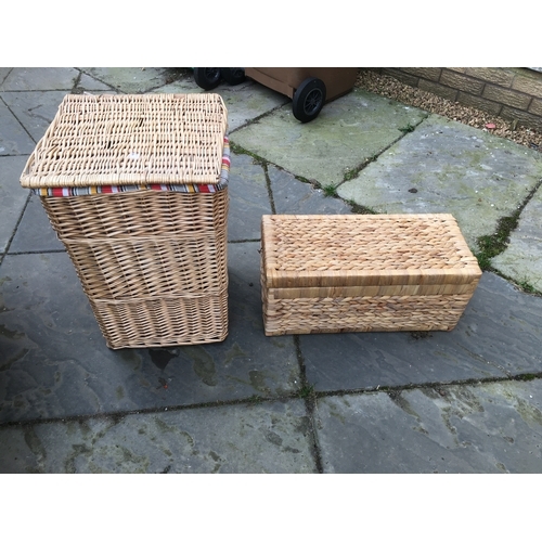 323 - as new Wicker tilt lidded laundry basket and Rattan long storage box 

235