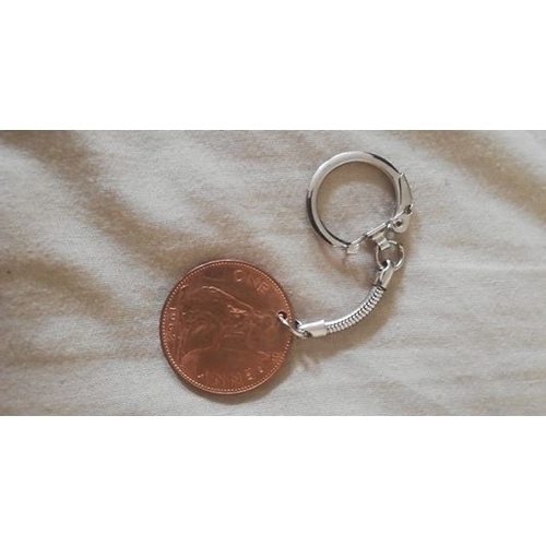 356 - 1967 penny keyring & 1965 half penny keyring