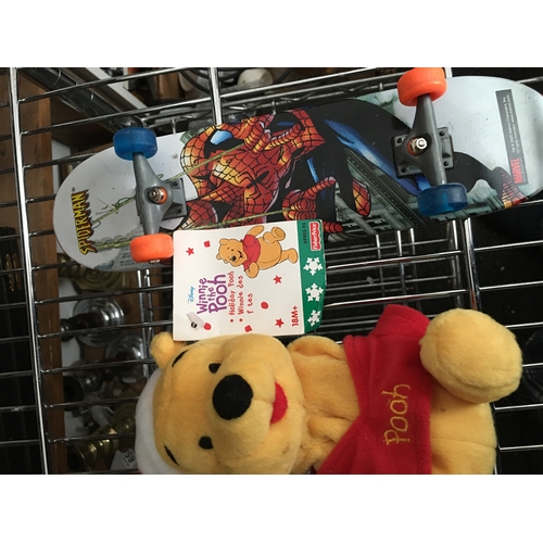 313 - SMALL SPIDERMAN TOY SKATEBOARD & WINNIE THE POOH SOFT TOY IN SANTA OUTFIT