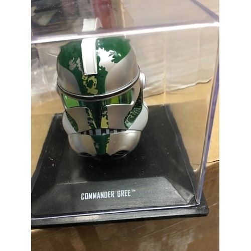 422 - CRACKING MINIATURE COMMANDER GREE HELMET IN PLASTIC DISPLAY