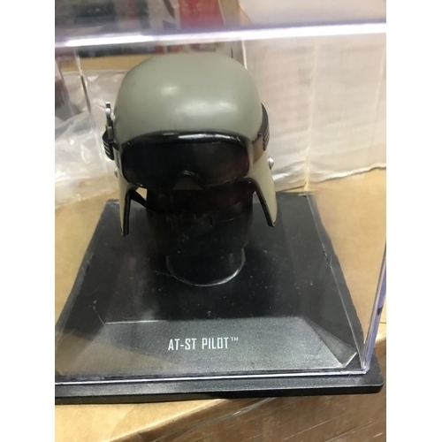 423 - CRACKING MINIATURE AT-ST PILOT HELMET IN PLASTIC DISPLAY BOX