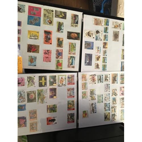 128 - ASSORTMENT OF FOUR PAGES OF JERSEY STAMPS 
L4