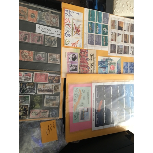 134 - THREE PAGES OF ASSORTED STAMPS

L10