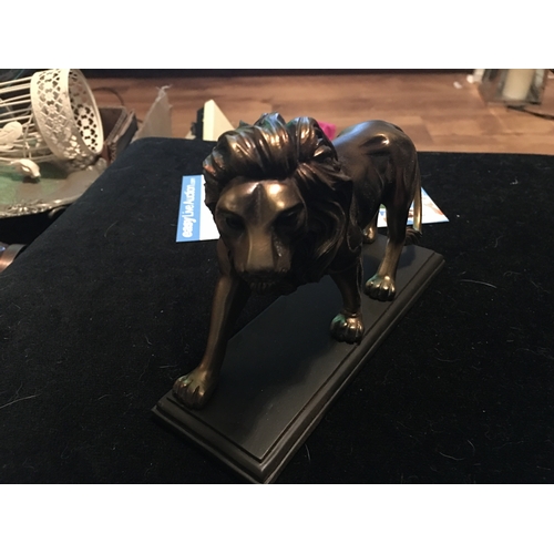 84 - LOVELY BRONZE EFFECT LION ON PLINTH 20CM LONG