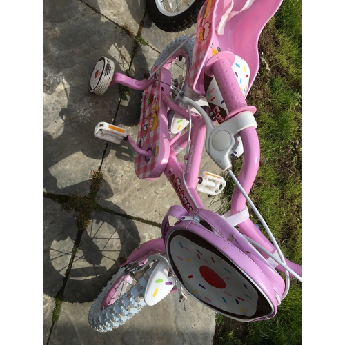 90 - GIRLS BIKE WITH STABALISERS IN FANTASTIC CONDITION IN PINK AND WHITE