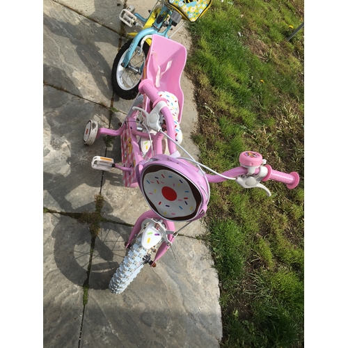 90 - GIRLS BIKE WITH STABALISERS IN FANTASTIC CONDITION IN PINK AND WHITE