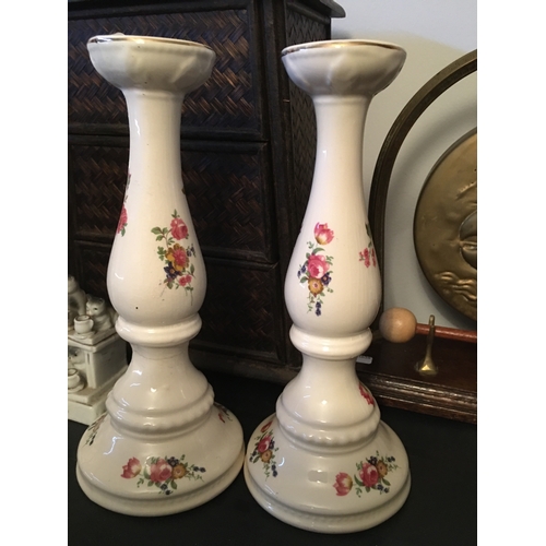 34 - PAIR OF FLORAL TALL CANDLESTICKS SLIGHT HAIRLINE TO ONE