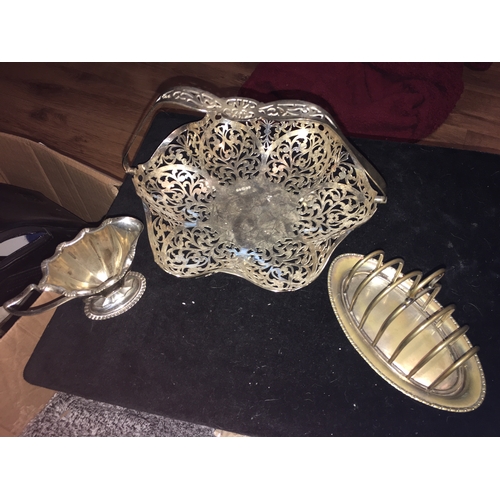 110 - NICE COLLECTION OF PLATED WARE INCLUDING LARGE PIERCED BASKET WITH HANDLE, CREAMER AND DECO TOAST RA... 