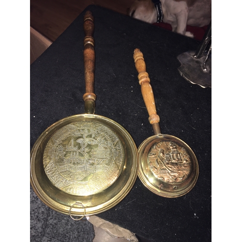 114 - TWO SMALL BRASS WOODHANDLED BED PANS