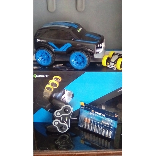 52 - FANTATSTIC BOXED EXOST FURY CROSS AMAZING 2-IN-1 REMOTE CONTROL CAR, TESTED AND FULLY WORKING