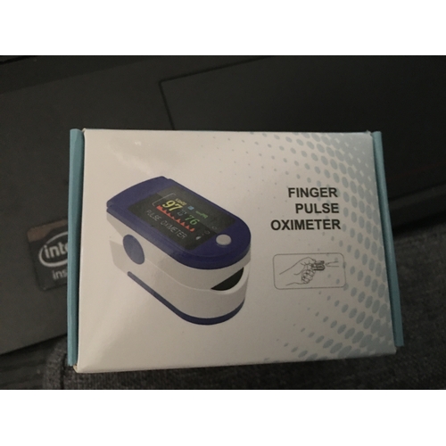 76 - NEW BOXED FINGER PULSE OXIMETER WITH BATTERIES